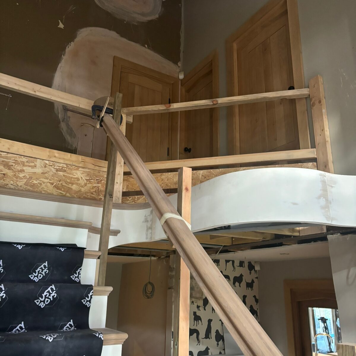 Landing and galleried stair under construction