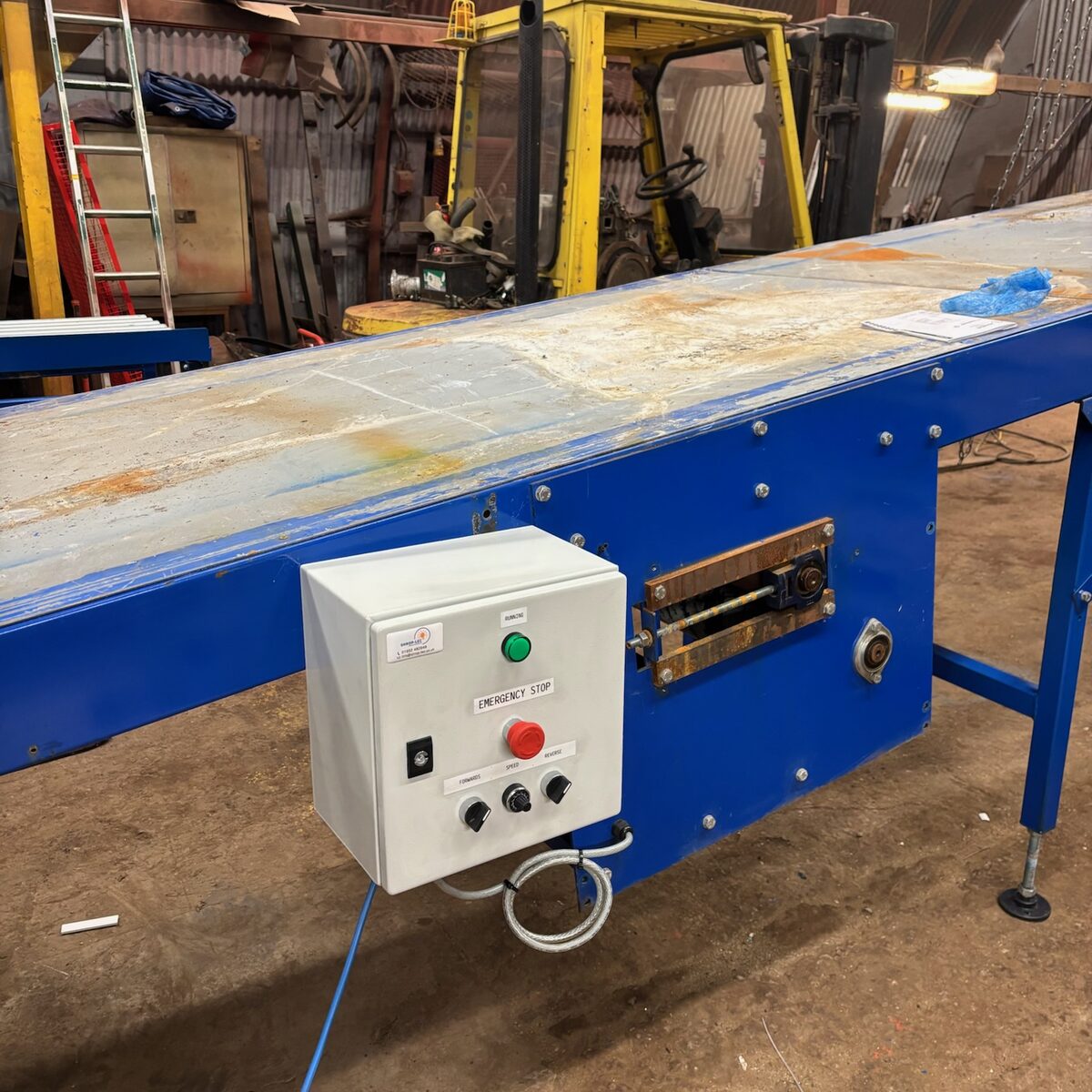 Control panel mounted on the conveyor line
