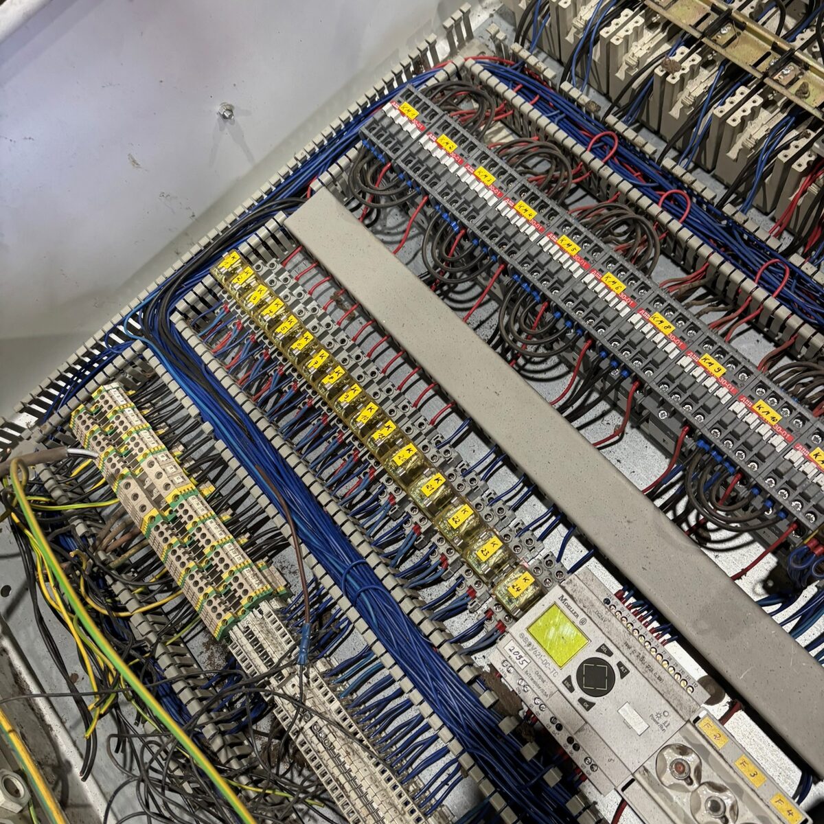 Loomed terminal rows inside the control panel