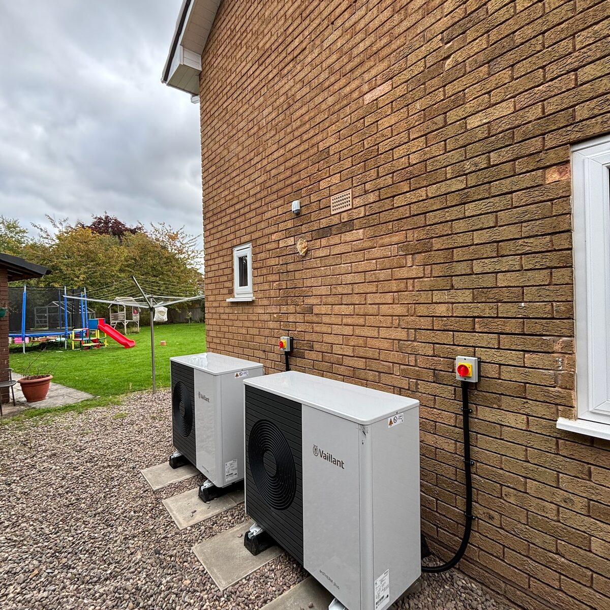 Outdoor unit positioned at the building