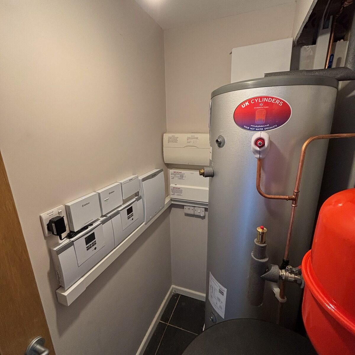 Cylinder room pipework and wiring centre