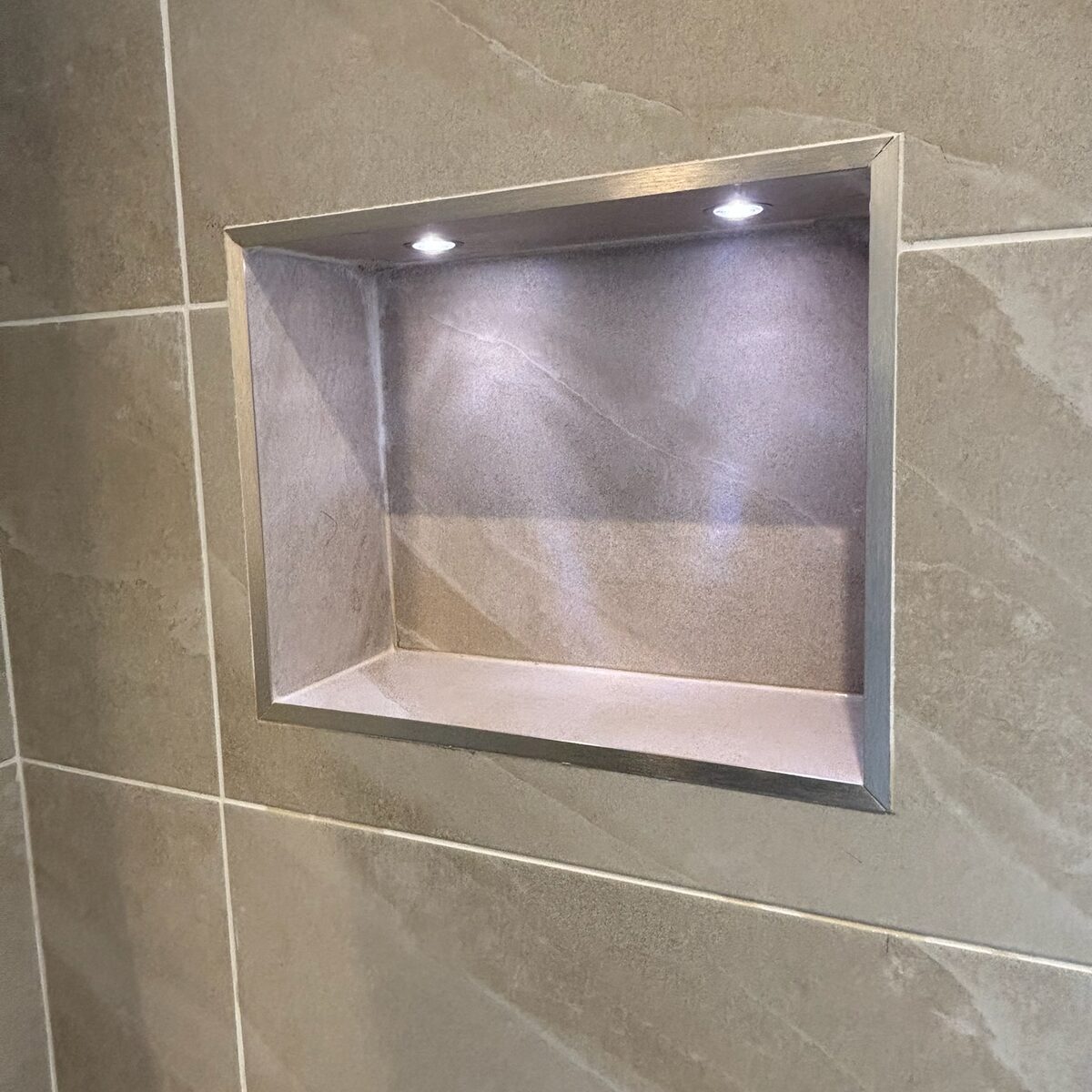 Recessed niche with warm lighting