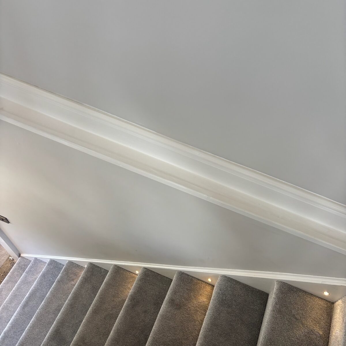 Staircase with recessed step lighting