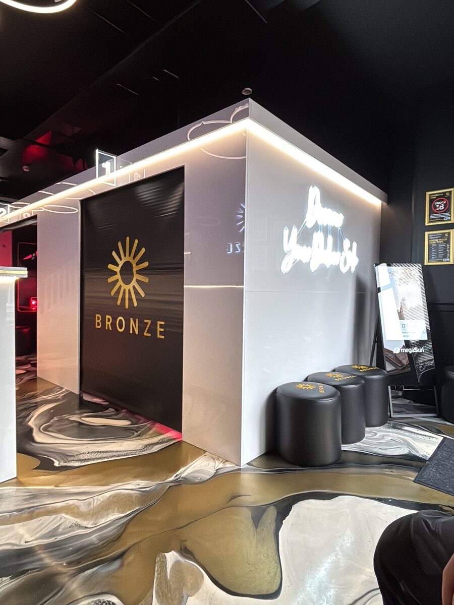 Finished salon interior with neon script and displays